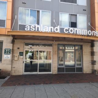 The entrance to Ashland Commons, a modern apartment building.