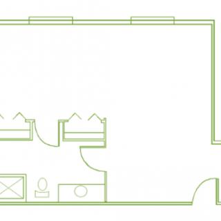 A simple architectural floor plan with room layout and bathroom area.
