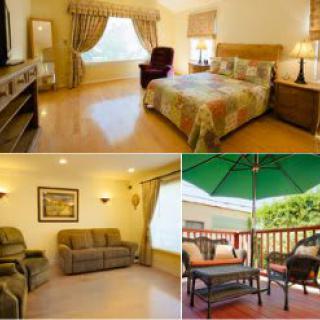 A cozy home interior featuring a bedroom, living room, and an outdoor patio area.