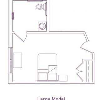 Studio apartment floor plan with bathroom and living area layout.