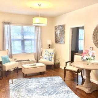 A cozy living room with stylish decor and comfortable seating.