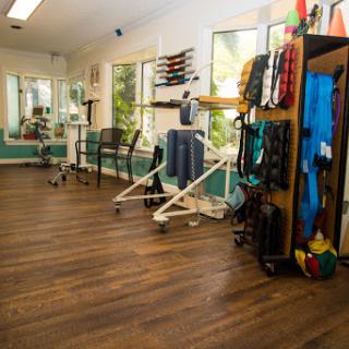 A well-equipped rehabilitation and fitness room designed for therapy and exercise.