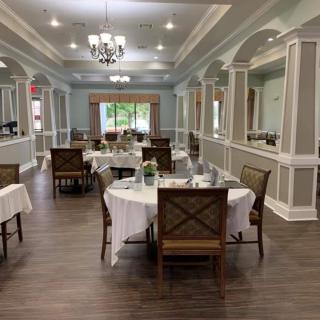 An elegant dining room with beautifully set tables and stylish decor.
