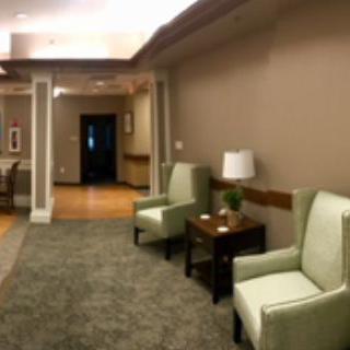 A cozy lobby area with comfortable seating and soft lighting.