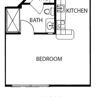 Studio apartment floor plan with a bedroom, kitchen, and bathroom.
