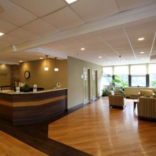 A modern and welcoming reception area with comfortable seating and abundant natural light.