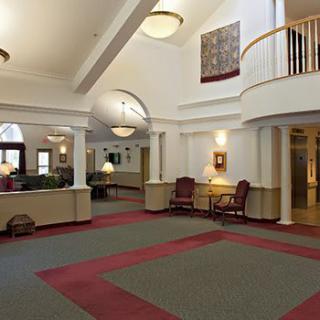 Spacious lobby area with elegant decor and comfortable seating.
