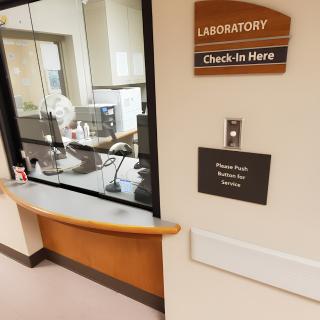 Laboratory check-in area at a medical facility.
