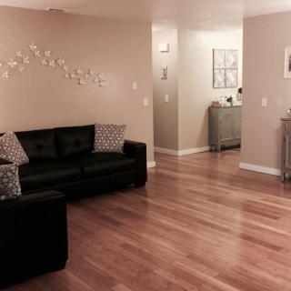 A cozy living room with hardwood floors and stylish decor.
