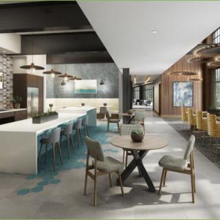 A modern interior featuring a spacious kitchen and dining area with stylish seating and contemporary decor.