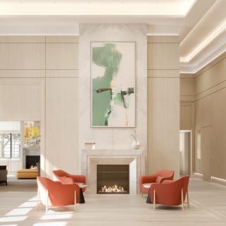 A modern living room with a central fireplace, surrounded by four orange chairs and adorned with abstract art.