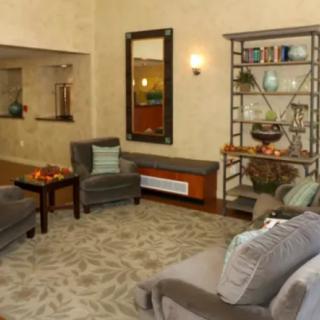 A cozy living room with comfortable seating and stylish decor.