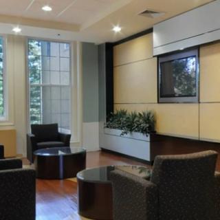 A modern lobby with comfortable seating and abundant natural light.