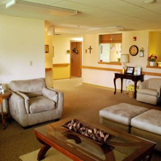 A cozy living room with comfortable seating and warm decor.