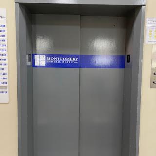 An elevator door in a building.