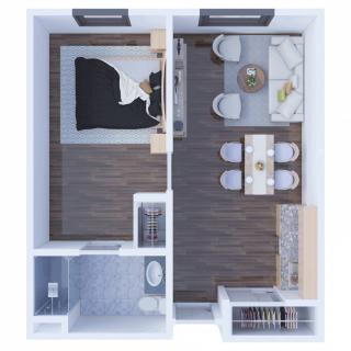 A compact one-bedroom apartment floor plan featuring a combined kitchen and living area.