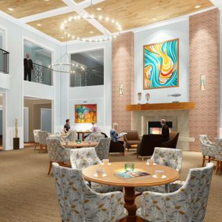 A modern and spacious lounge area featuring elegant furniture, vibrant artwork, and a cozy fireplace.