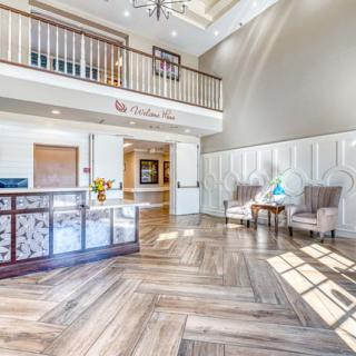 A modern, well-lit lobby with stylish furnishings and a welcoming reception area.