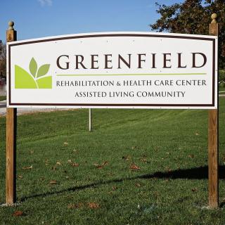 Sign for Greenfield Rehabilitation & Health Care Center and Assisted Living Community.