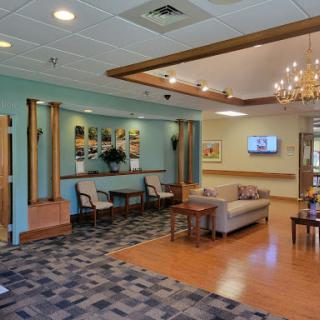 A welcoming and well-lit lobby area with comfortable seating and stylish decor.