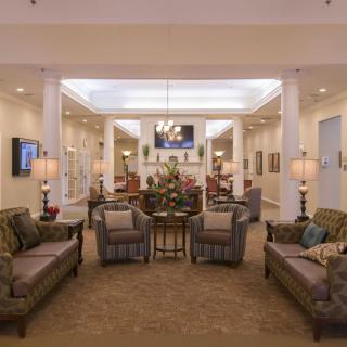 A spacious and elegantly designed lobby with comfortable seating arrangements and tasteful decor.