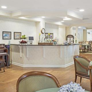 A cozy and inviting reception area with comfortable seating and elegant decor.