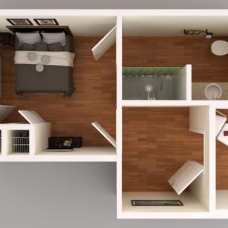 A top-down view of a compact apartment floor plan featuring a bedroom, bathroom, and hallway.