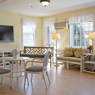 A bright and inviting living room with modern furniture and decor.