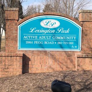 Welcome sign for Lexington Park, an active adult community.