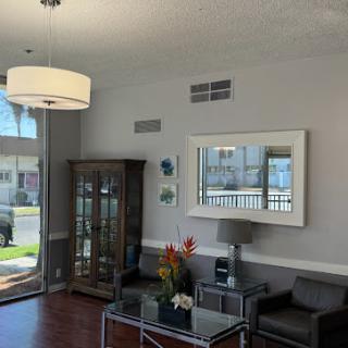 A modern living room featuring stylish furniture and a contemporary design.