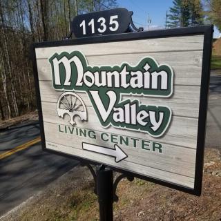 A directional sign for the Mountain Valley Living Center located at 1135.