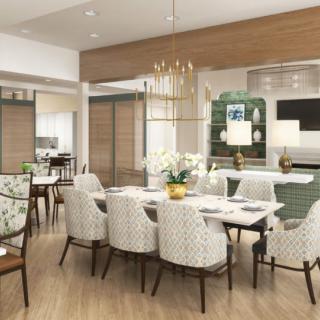 A modern dining room with elegant furnishings and a stylish chandelier.