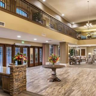 Spacious and elegantly designed lobby with stylish furniture and decor.