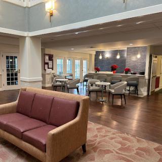 A spacious and inviting lobby with comfortable seating and modern decor.