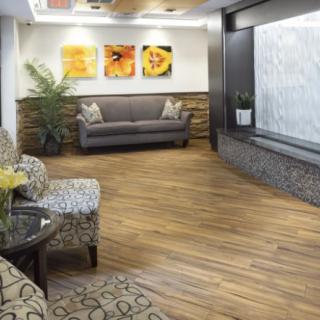 A modern waiting room with comfortable seating and tasteful decor.