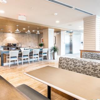 A modern and stylish restaurant interior with comfortable seating and elegant lighting.