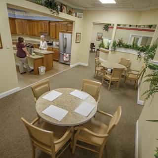 A spacious kitchen and dining area designed for communal gatherings.