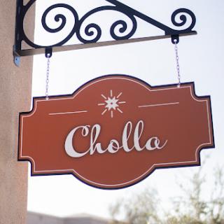 A decorative sign displaying the name 'Cholla'.
