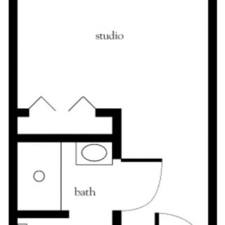 A floor plan of a studio apartment with a bathroom.