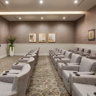 A modern conference room with luxury seating arrangements and elegant interior design.