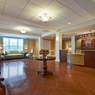 A welcoming lobby with comfortable seating and a reception desk.