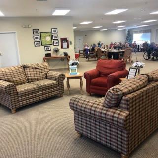 A cozy community room with comfortable sofas and a welcoming atmosphere.