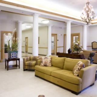 Modern living room with elegant decor and a comfortable seating area.