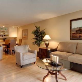 A cozy living room featuring comfortable seating and tasteful decor.