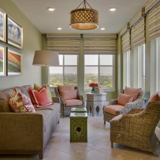 A cozy living room with elegant decor and abundant natural light.