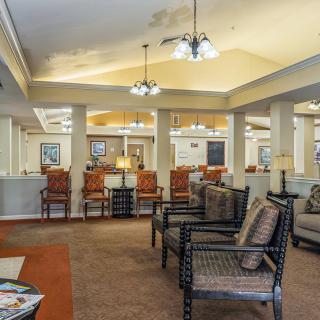 A spacious lobby area with comfortable seating and elegant lighting.