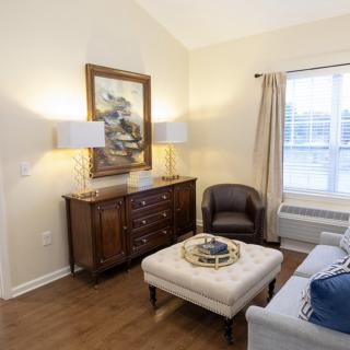 A cozy living room with elegant furniture and stylish decor.