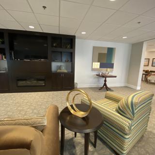 A modern living room with comfortable seating and stylish decor.