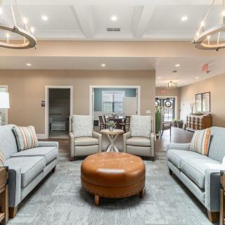 A modern living room with comfortable seating and stylish decor.