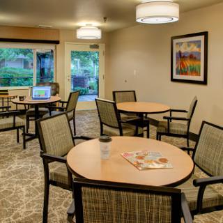 A cozy waiting area with modern furniture, perfect for relaxation and socializing.
